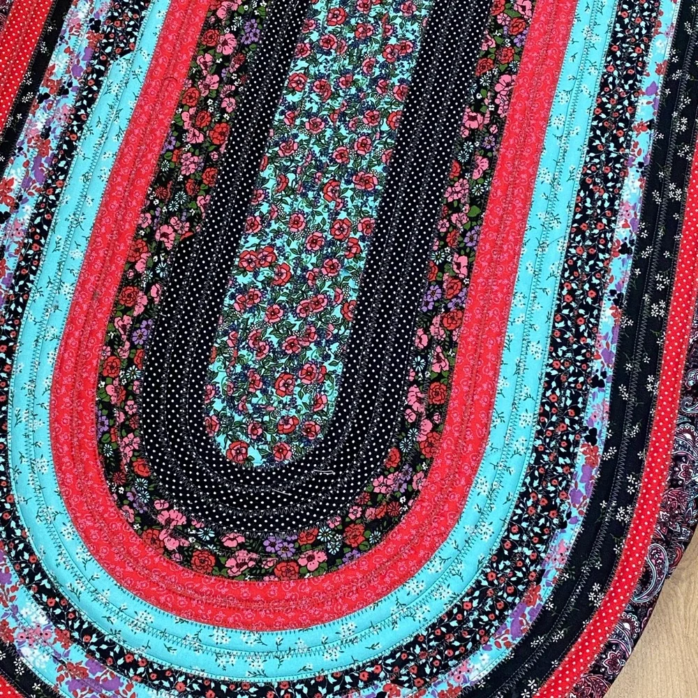 Oval Floral Jelly Roll Rug in Red, Black & Turquoise